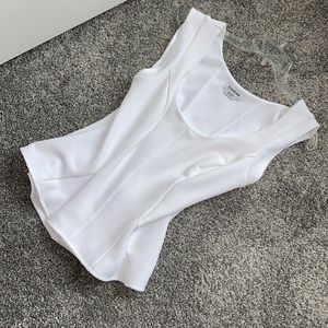 Stretch, fitted white tank top with flared bottom